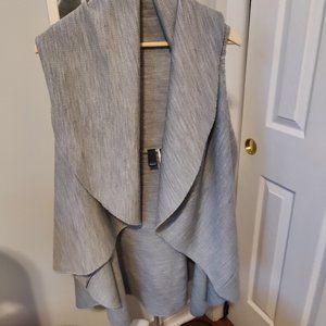 Sleeveless sweater wrap.  One size fits large